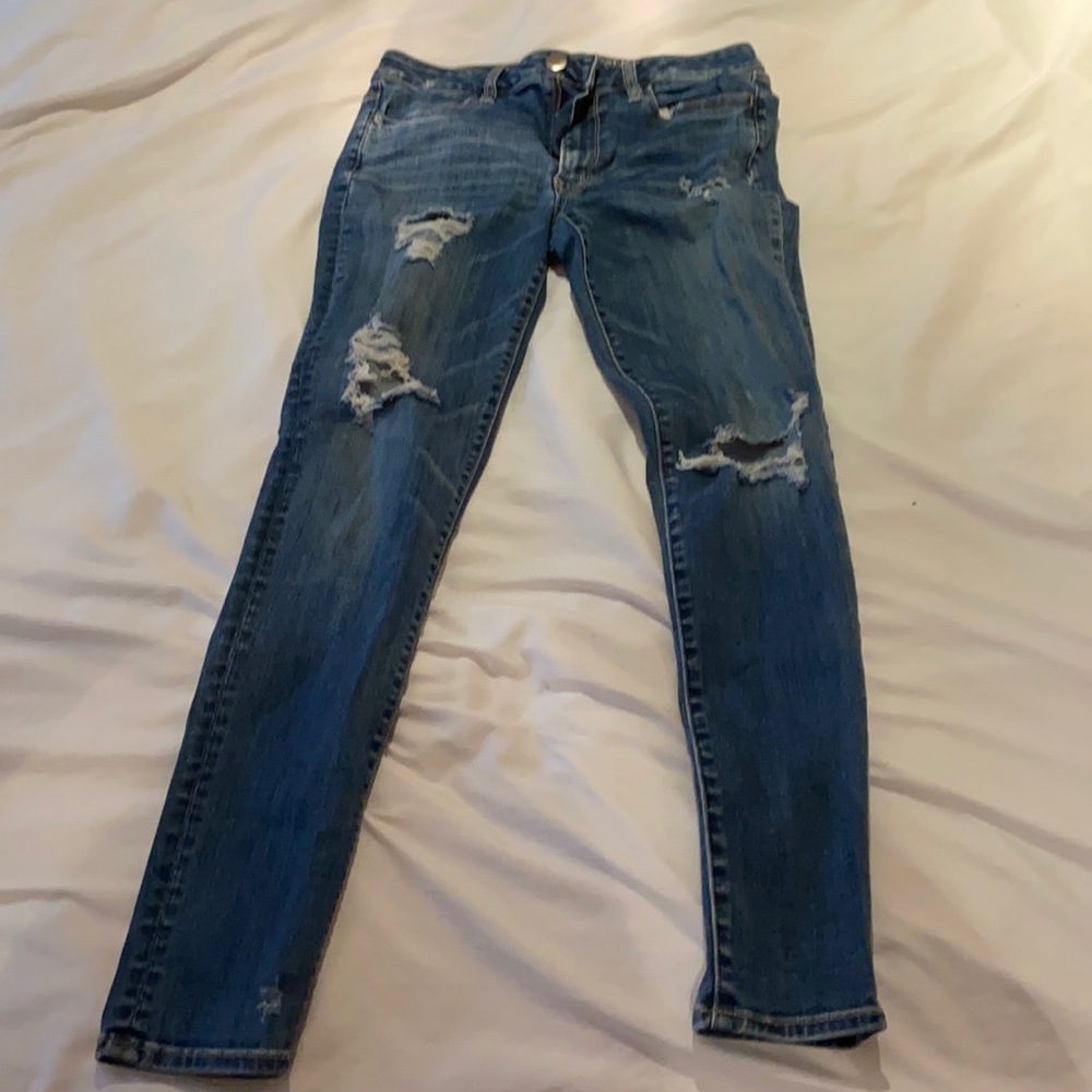 american eagle dark blue jeans ripped worn twice